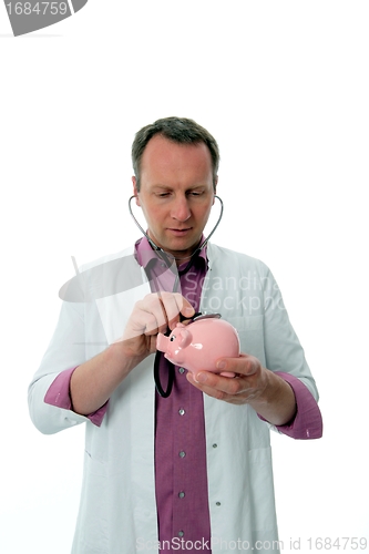 Image of Doctor with piggy bank and stethoscope