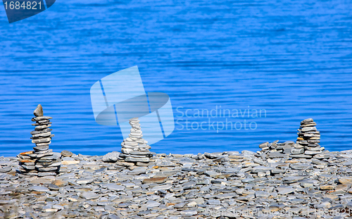 Image of pyramids of stones on the beach
