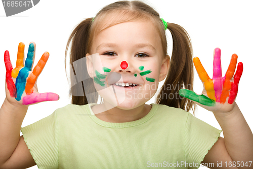 Image of Cheerful girl with painted hands