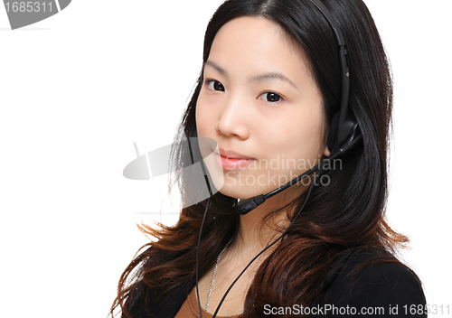 Image of asian woman wearing headset