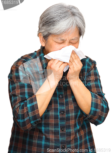 Image of sneezing woman