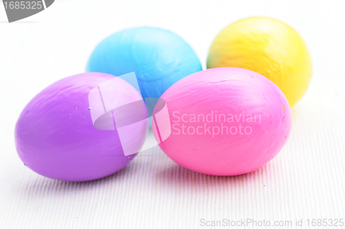 Image of children paint colorful easter eggs