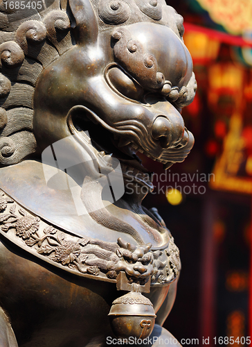 Image of Bronze lion in chinese temple