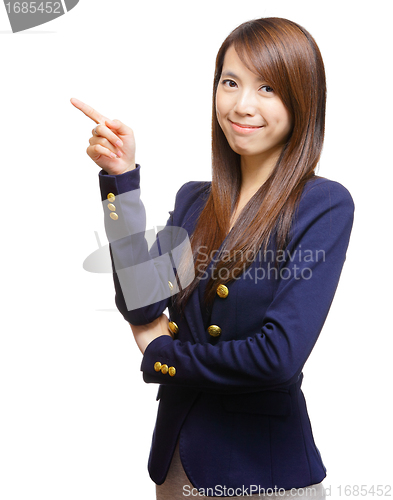 Image of young asian woman pointing a side