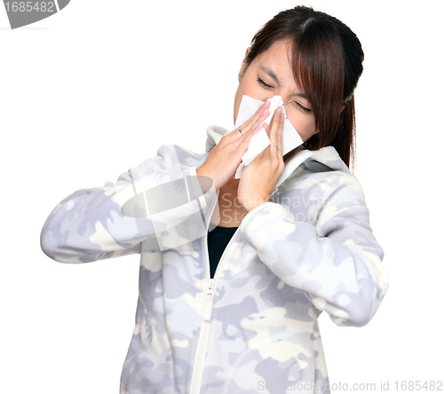 Image of sneezing woman