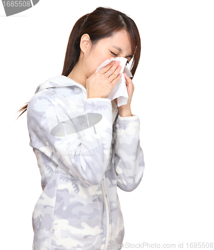 Image of sneezing asian young woman