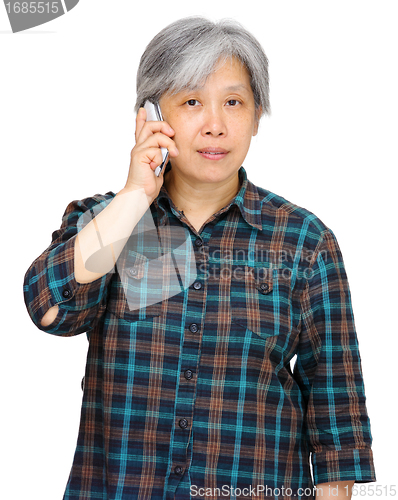 Image of mature woman using mobile phone