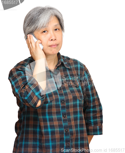 Image of mature woman using mobile phone