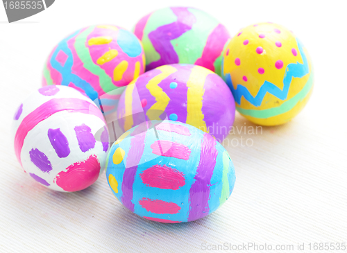 Image of children paint colorful easter eggs