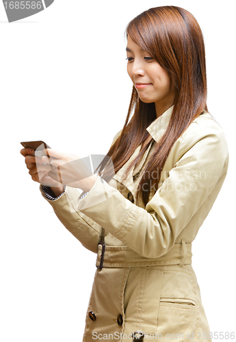 Image of woman using mobile phone sms