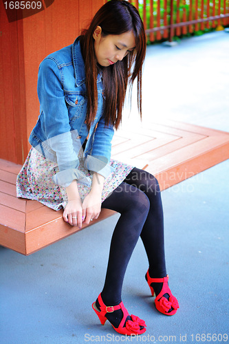 Image of fashion girl in park