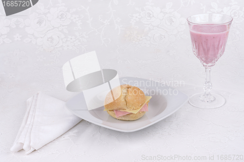 Image of Strawberry shake in a glass .