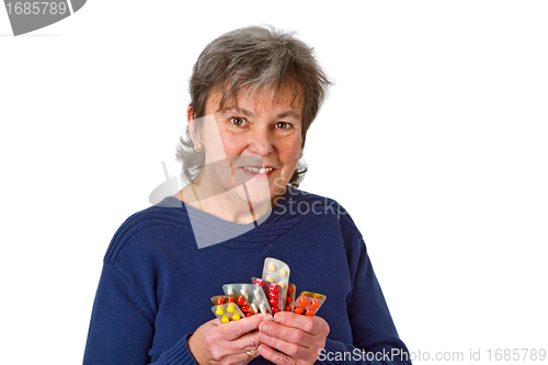 Image of Female senior with pills
