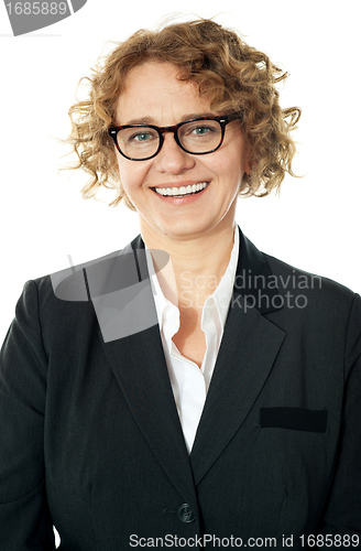 Image of Cropped image of a curly haired business lady
