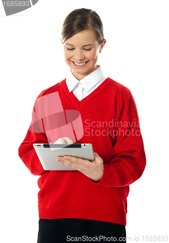 Image of School girl using new touch pad device