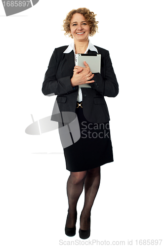 Image of Female excutive holding apple i-pad