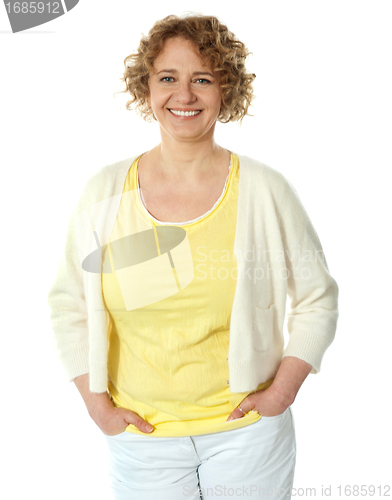 Image of Portrait of smiling woman posing in trendy attire