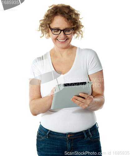 Image of Glamorous lady using her tablet pc