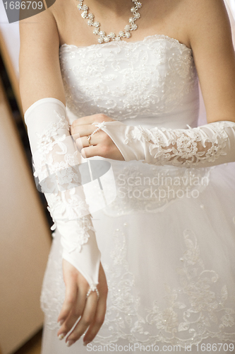 Image of Pre-ceremony bride dressing