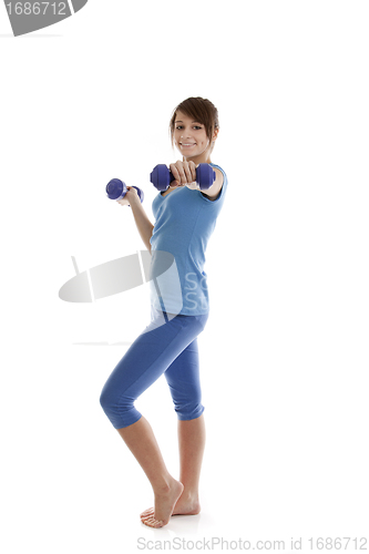 Image of Beautiful girl with dumbbells