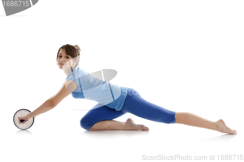 Image of Girl with a gymnastic roller