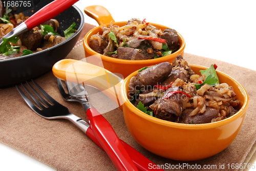 Image of Chicken liver with onion and walnuts.