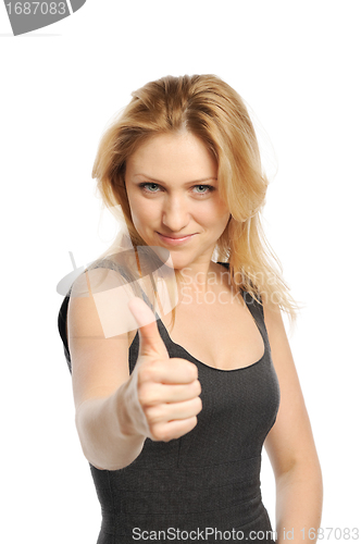 Image of Young beautiful woman thumbs up