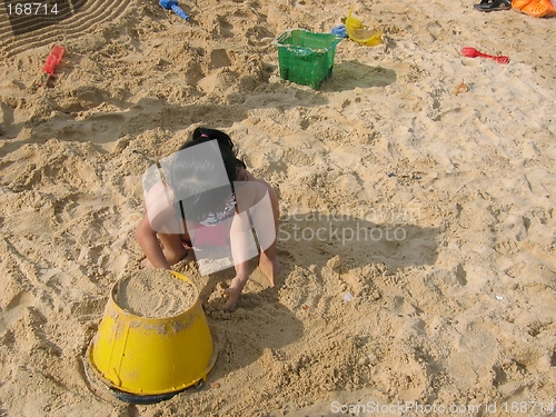 Image of Little Girl Playing With Sand