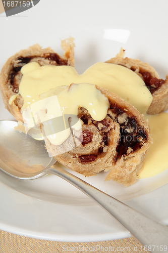 Image of Spotted dick pudding and custard