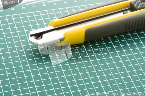 Image of Cutting board with pen knife

