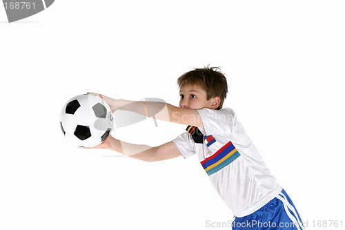 Image of Child playing soccer