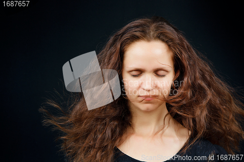Image of attractive girl with closed eyes