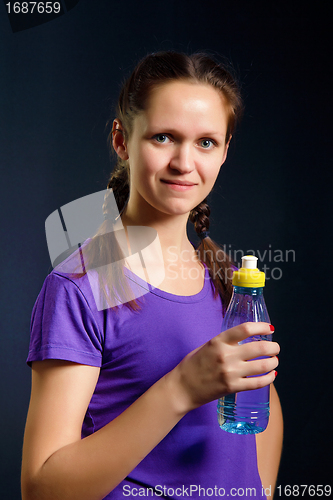 Image of woman with a bottle of water