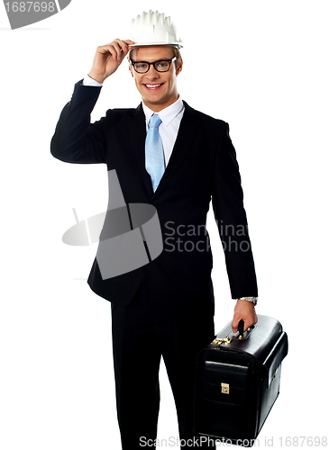 Image of Handsome american architect holding a briefcase