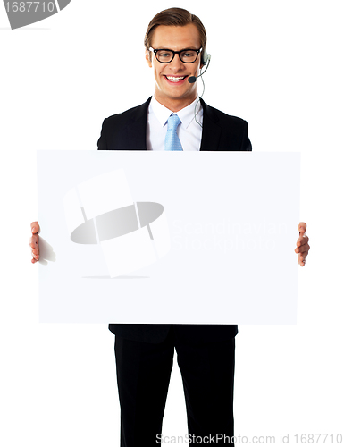 Image of Smiling male operator with blank billboard