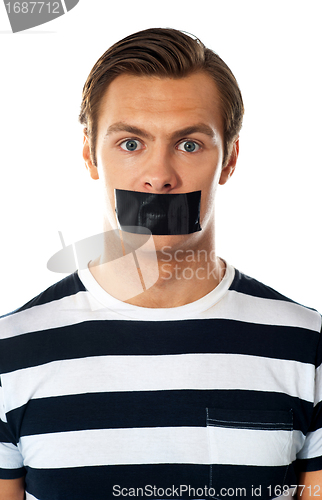 Image of Man with duct tape over his mouth