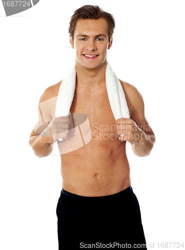 Image of Sexy muscular man with a towel