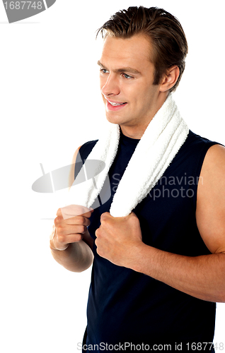 Image of Handsome man with towel around neck