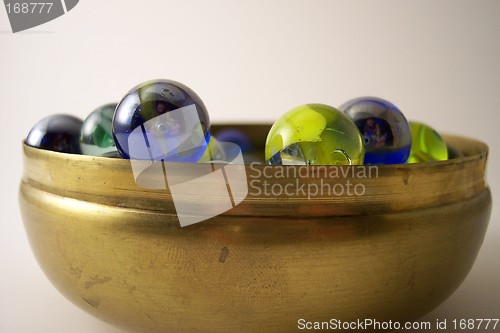 Image of marbles in silver bowl