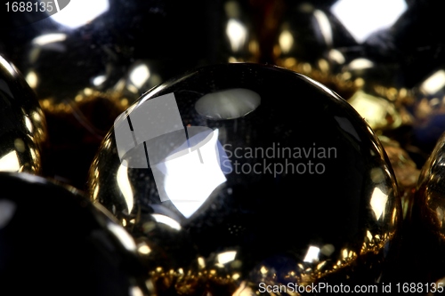 Image of golden christmas sphere reflection