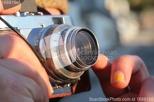 Image of analog camera photographer