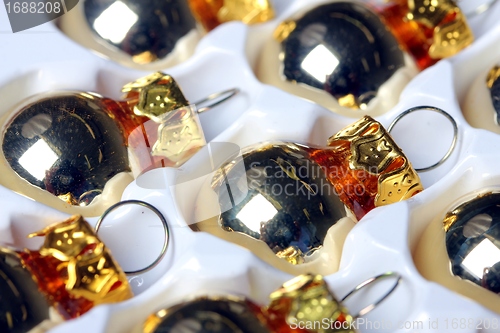 Image of golden christmas spheres reflection