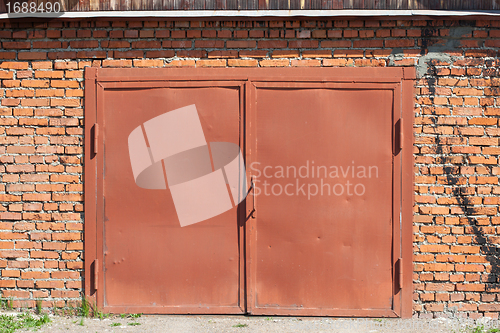 Image of red metal doors