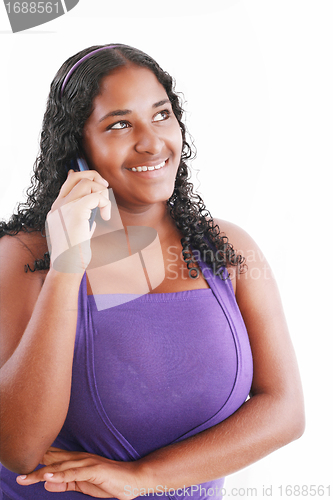 Image of happy african woman speaking at her telephone (isolated on white