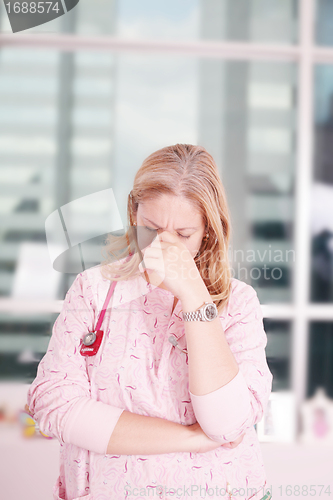 Image of Overburdened doctor at the hospital in the stress 