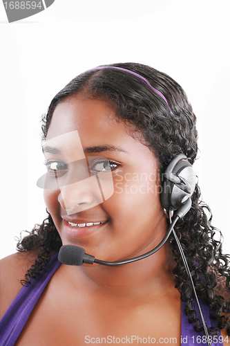 Image of Smiling black customer service and support woman wearing headset