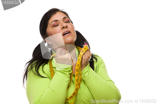 Image of Frustrated Hispanic Woman with Tape Measure