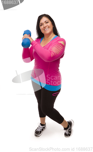 Image of Hispanic Woman In Workout Clothes Lifting Dumbbell