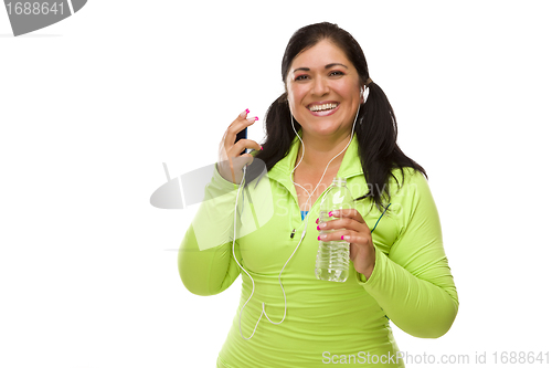 Image of Hispanic Woman In Workout Clothes with Music Player and Headphon