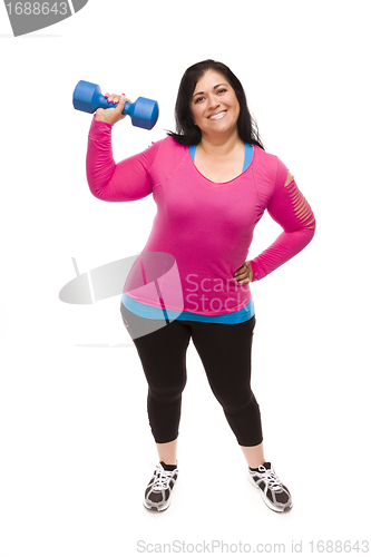 Image of Hispanic Woman In Workout Clothes Lifting Dumbbell